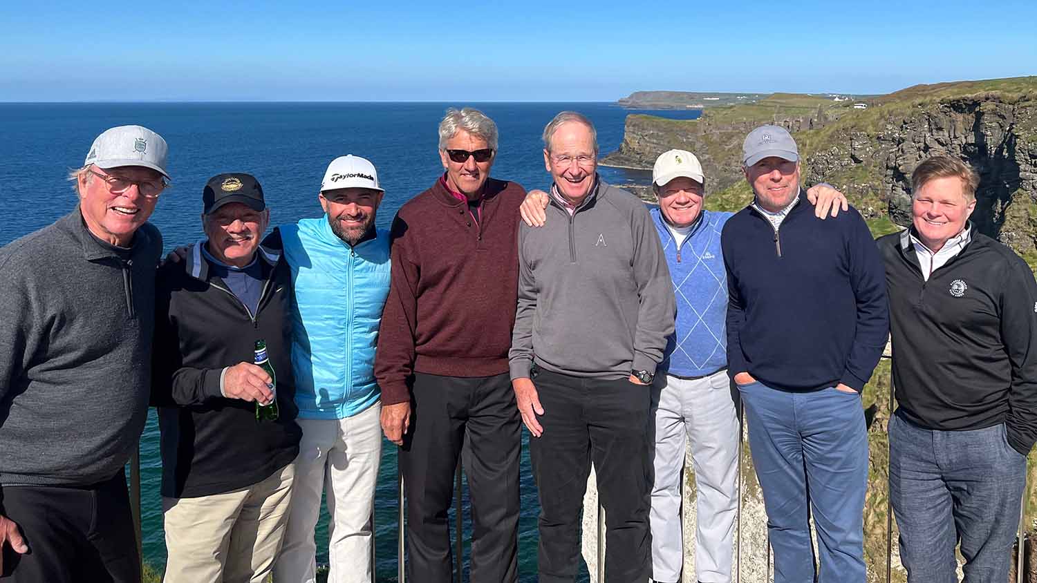 Golfers visiting Dunluce Castle