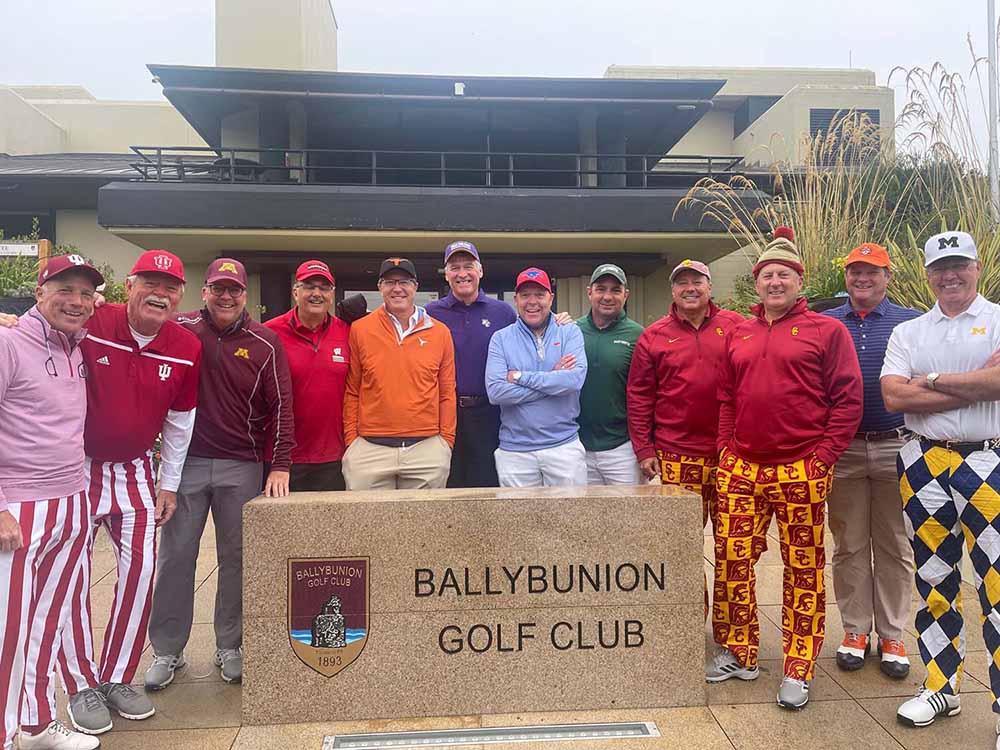 Golfers in Ireland wearing football shirts.