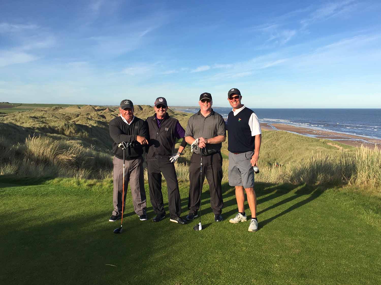 Golfers playing Trump Aberdeen Scotland